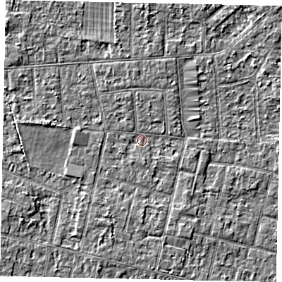 Shaded relief map of the ground around TW151ES, computed from Environment Agency LiDAR. The ground here sits at about 13 m above sea level and falls 2 m across the surrounding 800 m. Surface water reaching this point runs off ground lying to the west, 1.8 m higher.