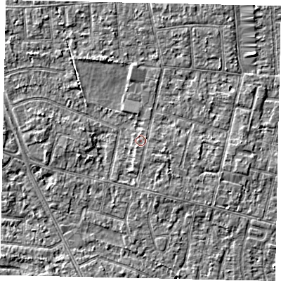 Shaded relief map of the ground around TW151EX, computed from Environment Agency LiDAR. The ground here sits at about 14 m above sea level and falls 3 m across the surrounding 800 m. The ground contributing surface water to this point lies to the east-south-east.