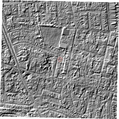 Shaded relief map of the ground around TW151EZ, computed from Environment Agency LiDAR. The ground here sits at about 13 m above sea level and falls 3 m across the surrounding 800 m. Surface water reaching this point runs off ground lying to the west, 2.1 m higher.