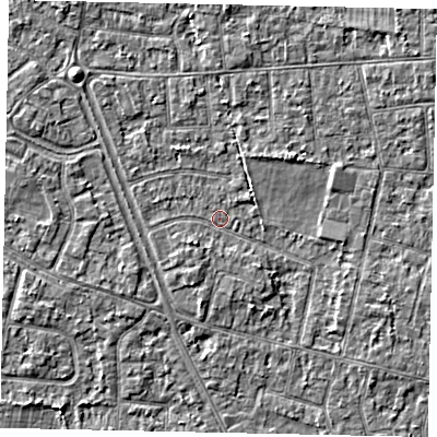 Shaded relief map of the ground around TW151HA, computed from Environment Agency LiDAR. The ground here sits at about 13 m above sea level and falls 3 m across the surrounding 800 m. Surface water reaching this point runs off ground lying to the north-west, 2.7 m higher.