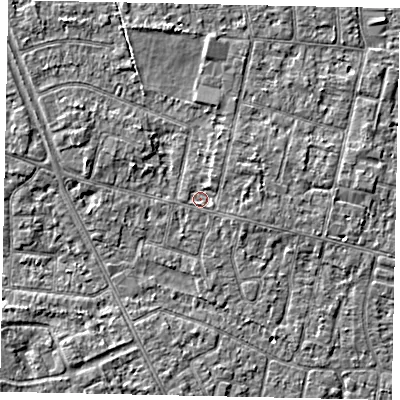 Shaded relief map of the ground around TW151HG, computed from Environment Agency LiDAR. The ground here sits at about 13 m above sea level and falls 3 m across the surrounding 800 m. Surface water reaching this point runs off ground lying to the north-east, 1.5 m higher.