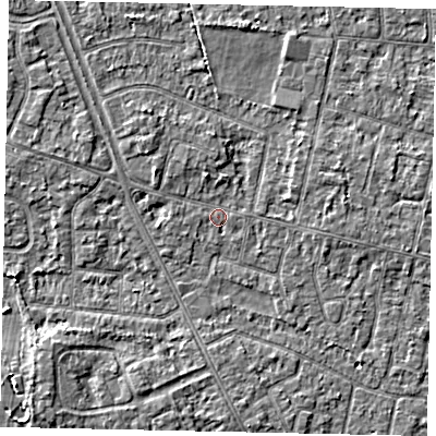 Shaded relief map of the ground around TW151HN, computed from Environment Agency LiDAR. The ground here sits at about 13 m above sea level and falls 3 m across the surrounding 800 m. Surface water reaching this point runs off ground lying to the west, 0.8 m higher.