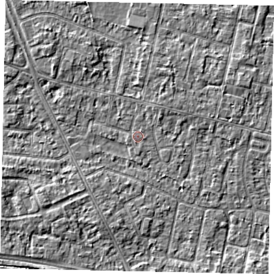 Shaded relief map of the ground around TW151LB, computed from Environment Agency LiDAR. The ground here sits at about 13 m above sea level and falls 3 m across the surrounding 800 m. The ground contributing surface water to this point lies to the west-south-west.