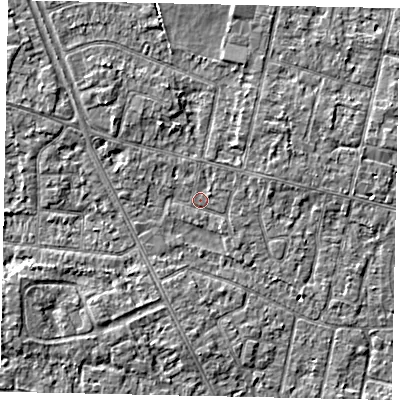 Shaded relief map of the ground around TW151LD, computed from Environment Agency LiDAR. The ground here sits at about 13 m above sea level and falls 3 m across the surrounding 800 m. Surface water reaching this point runs off ground lying to the south-west, 2.6 m higher.