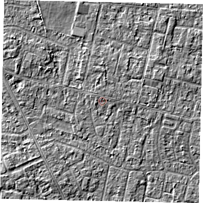 Shaded relief map of the ground around TW151LF, computed from Environment Agency LiDAR. The ground here sits at about 13 m above sea level and falls 3 m across the surrounding 800 m. Surface water reaching this point runs off ground lying to the east-north-east, 1.0 m higher.