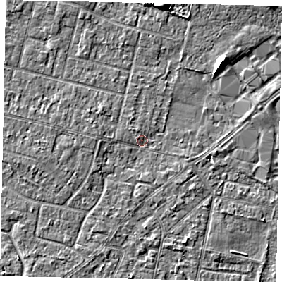 Shaded relief map of the ground around TW151LP, computed from Environment Agency LiDAR. The ground here sits at about 13 m above sea level and falls 6 m across the surrounding 800 m. Surface water reaching this point runs off ground lying to the east-south-east, 1.4 m higher.