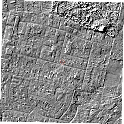 Shaded relief map of the ground around TW151NJ, computed from Environment Agency LiDAR. The ground here sits at about 13 m above sea level and falls 6 m across the surrounding 800 m. Surface water reaching this point runs off ground lying to the west, 1.7 m higher.