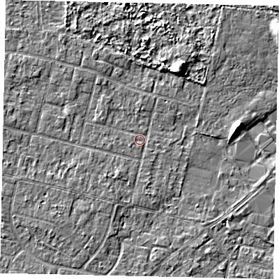 Shaded relief map of the ground around TW151PG, computed from Environment Agency LiDAR. The ground here sits at about 13 m above sea level and falls 6 m across the surrounding 800 m. Surface water reaching this point runs off ground lying to the south-west, 1.3 m higher.