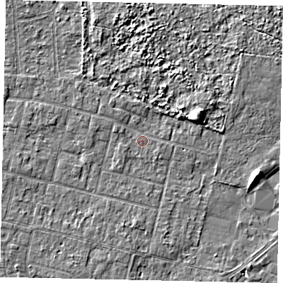 Shaded relief map of the ground around TW151PJ, computed from Environment Agency LiDAR. The ground here sits at about 13 m above sea level and falls 6 m across the surrounding 800 m. Surface water reaching this point runs off ground lying to the east-north-east, 5.3 m higher.