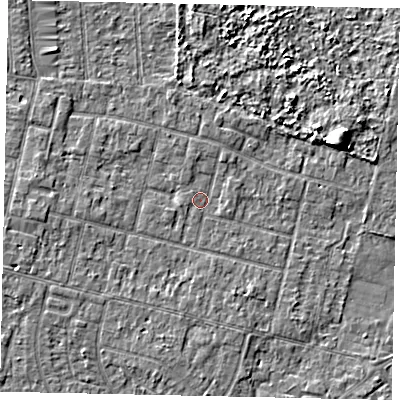 Shaded relief map of the ground around TW151PL, computed from Environment Agency LiDAR. The ground here sits at about 13 m above sea level and falls 6 m across the surrounding 800 m. Surface water reaching this point runs off ground lying to the north, 0.9 m higher.