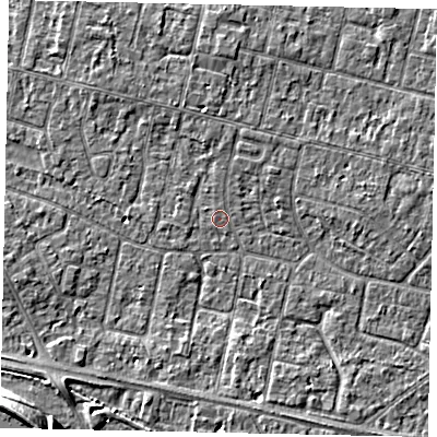 Shaded relief map of the ground around TW151QA, computed from Environment Agency LiDAR. The ground here sits at about 13 m above sea level and falls 12 m across the surrounding 800 m. Surface water reaching this point runs off ground lying to the north-north-east, 1.1 m higher.