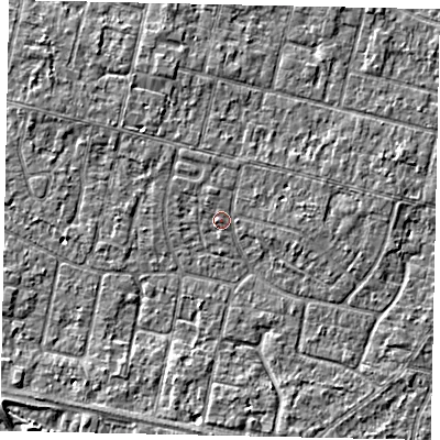 Shaded relief map of the ground around TW151QF, computed from Environment Agency LiDAR. The ground here sits at about 13 m above sea level and falls 3 m across the surrounding 800 m. Surface water reaching this point runs off ground lying to the north-west, 2.3 m higher.