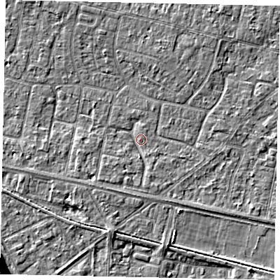 Shaded relief map of the ground around TW151RN, computed from Environment Agency LiDAR. The ground here sits at about 13 m above sea level and falls 12 m across the surrounding 800 m. Surface water reaching this point runs off ground lying to the south-west, 1.9 m higher.