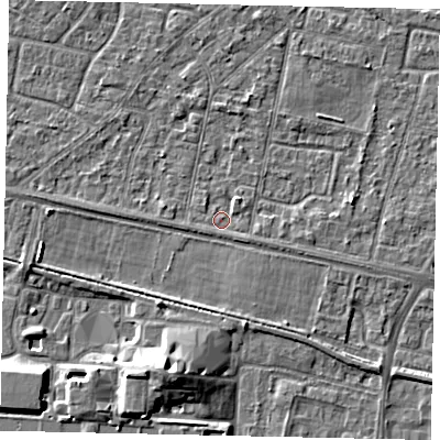 Shaded relief map of the ground around TW151RT, computed from Environment Agency LiDAR. The ground here sits at about 13 m above sea level and falls 8 m across the surrounding 800 m. Surface water reaching this point runs off ground lying to the south-east, 1.3 m higher.
