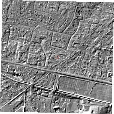 Shaded relief map of the ground around TW151ST, computed from Environment Agency LiDAR. The ground here sits at about 13 m above sea level and falls 6 m across the surrounding 800 m. Surface water reaching this point runs off ground lying to the south-west, 1.1 m higher.