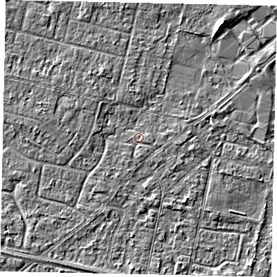 Shaded relief map of the ground around TW151SX, computed from Environment Agency LiDAR. The ground here sits at about 13 m above sea level and falls 5 m across the surrounding 800 m. Surface water reaching this point runs off ground lying to the south, 0.7 m higher.