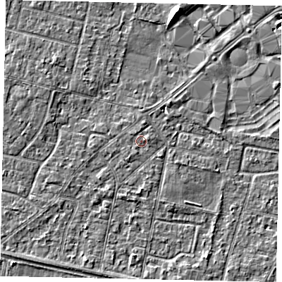 Shaded relief map of the ground around TW151SY, computed from Environment Agency LiDAR. The ground here sits at about 13 m above sea level and falls 6 m across the surrounding 800 m. Surface water reaching this point runs off ground lying to the east-north-east, 0.8 m higher.