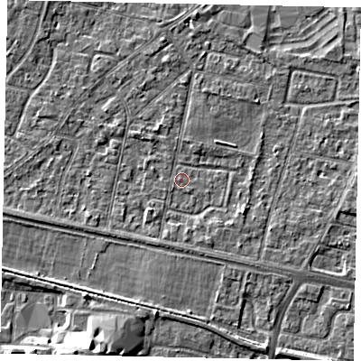 Shaded relief map of the ground around TW151TP, computed from Environment Agency LiDAR. The ground here sits at about 13 m above sea level and falls 7 m across the surrounding 800 m. Surface water reaching this point runs off ground lying to the east-south-east, 2.3 m higher.