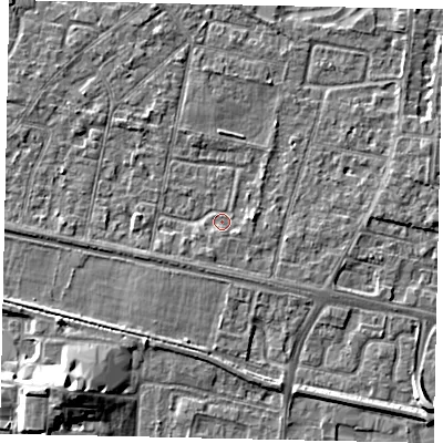 Shaded relief map of the ground around TW151TT, computed from Environment Agency LiDAR. The ground here sits at about 13 m above sea level and falls 7 m across the surrounding 800 m. Surface water reaching this point runs off ground lying to the east, 1.6 m higher.