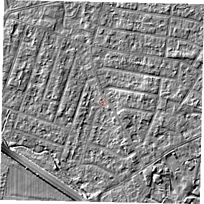 Shaded relief map of the ground around TW153RH, computed from Environment Agency LiDAR. The ground here sits at about 14 m above sea level and falls 4 m across the surrounding 800 m. Surface water reaching this point runs off ground lying to the east, 1.5 m higher.
