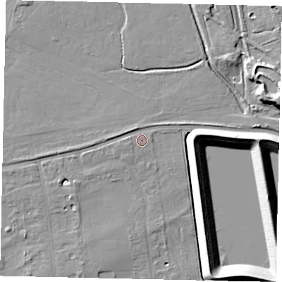 Shaded relief map of the ground around TW165AP, computed from Environment Agency LiDAR. The ground here sits at about 12 m above sea level and falls 14 m across the surrounding 800 m. Surface water reaching this point runs off ground lying to the west, 1.4 m higher.