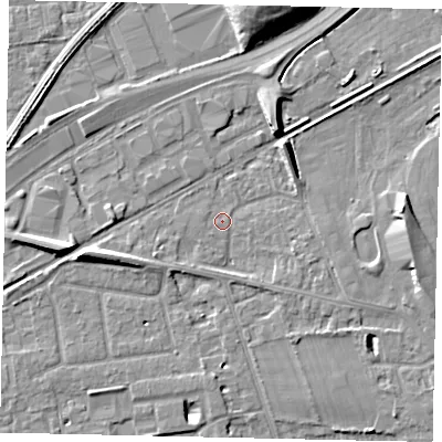 Shaded relief map of the ground around TW165BN, computed from Environment Agency LiDAR. The ground here sits at about 11 m above sea level and falls 12 m across the surrounding 800 m. Surface water reaching this point runs off ground lying to the north-east, 5.1 m higher.
