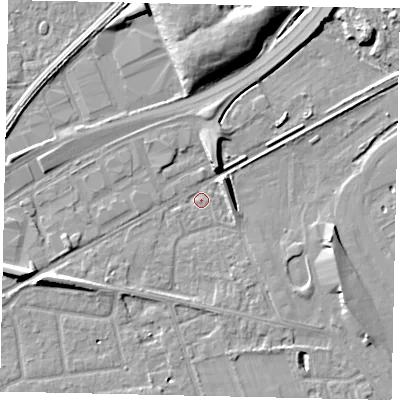 Shaded relief map of the ground around TW165BT, computed from Environment Agency LiDAR. The ground here sits at about 11 m above sea level and falls 10 m across the surrounding 800 m. Surface water reaching this point runs off ground lying to the north-east, 5.7 m higher.
