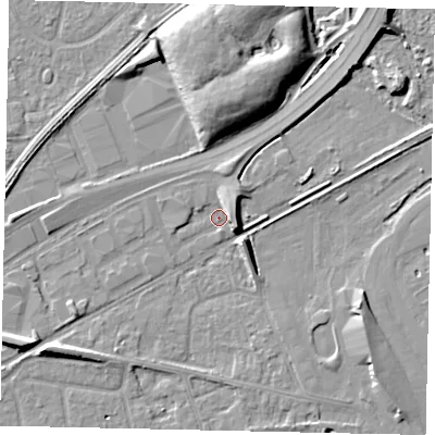 Shaded relief map of the ground around TW165BX, computed from Environment Agency LiDAR. The ground here sits at about 12 m above sea level and falls 10 m across the surrounding 800 m. Surface water reaching this point runs off ground lying to the east-south-east, 4.6 m higher.