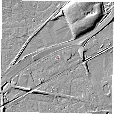 Shaded relief map of the ground around TW165DA, computed from Environment Agency LiDAR. The ground here sits at about 12 m above sea level and falls 10 m across the surrounding 800 m. The ground contributing surface water to this point lies to the west.