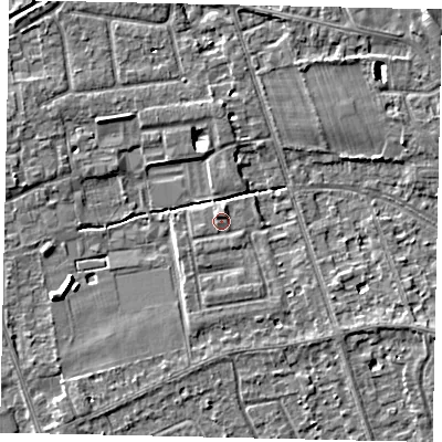 Shaded relief map of the ground around TW165DH, computed from Environment Agency LiDAR. The ground here sits at about 12 m above sea level and falls 6 m across the surrounding 800 m. Surface water reaching this point runs off ground lying to the south-west, 0.7 m higher.
