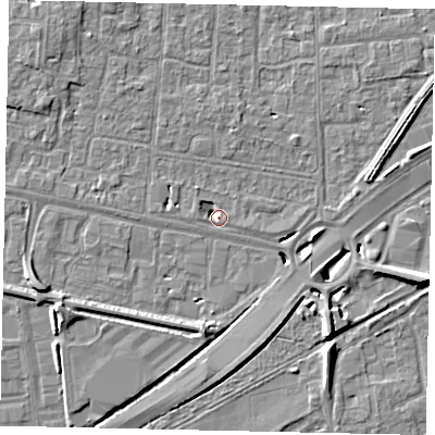 Shaded relief map of the ground around TW167AH, computed from Environment Agency LiDAR. The ground here sits at about 12 m above sea level and falls 8 m across the surrounding 800 m. Surface water reaching this point runs off ground lying to the west, 2.6 m higher.