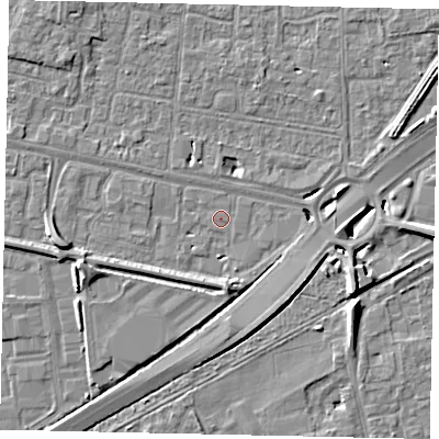 Shaded relief map of the ground around TW167AT, computed from Environment Agency LiDAR. The ground here sits at about 12 m above sea level and falls 8 m across the surrounding 800 m. Surface water reaching this point runs off ground lying to the south-west, 1.1 m higher.