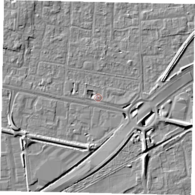 Shaded relief map of the ground around TW167AU, computed from Environment Agency LiDAR. The ground here sits at about 12 m above sea level and falls 8 m across the surrounding 800 m. Surface water reaching this point runs off ground lying to the west, 2.6 m higher.