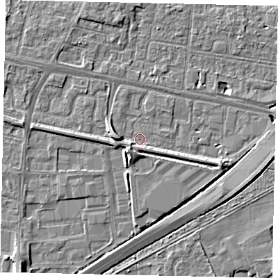 Shaded relief map of the ground around TW167BY, computed from Environment Agency LiDAR. The ground here sits at about 12 m above sea level and falls 7 m across the surrounding 800 m. Surface water reaching this point runs off ground lying to the west, 4.0 m higher.