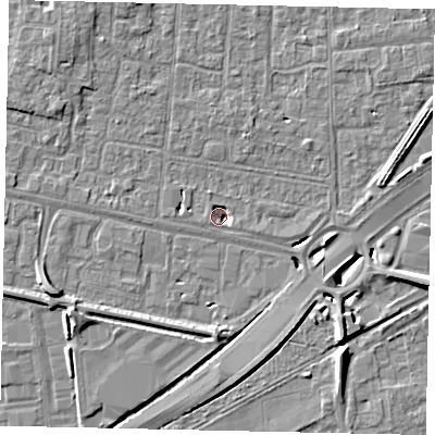 Shaded relief map of the ground around TW167FE, computed from Environment Agency LiDAR. The ground here sits at about 12 m above sea level and falls 8 m across the surrounding 800 m. Surface water reaching this point runs off ground lying to the west-south-west, 2.6 m higher.