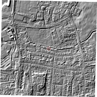 Shaded relief map of the ground around TW167PT, computed from Environment Agency LiDAR. The ground here sits at about 12 m above sea level and falls 4 m across the surrounding 800 m. Surface water reaching this point runs off ground lying to the west-south-west, 2.5 m higher.