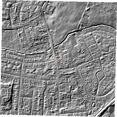 Shaded relief map of the ground around TW167QH, computed from Environment Agency LiDAR. The ground here sits at about 13 m above sea level and falls 3 m across the surrounding 800 m. Surface water reaching this point runs off ground lying to the south, 1.1 m higher.