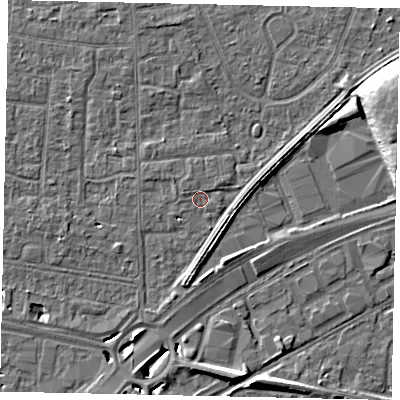 Shaded relief map of the ground around TW167RB, computed from Environment Agency LiDAR. The ground here sits at about 12 m above sea level and falls 11 m across the surrounding 800 m. Surface water reaching this point runs off ground lying to the west-north-west, 0.8 m higher.