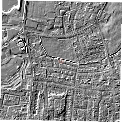 Shaded relief map of the ground around TW167RG, computed from Environment Agency LiDAR. The ground here sits at about 12 m above sea level and falls 4 m across the surrounding 800 m. Surface water reaching this point runs off ground lying to the south-west, 2.5 m higher.