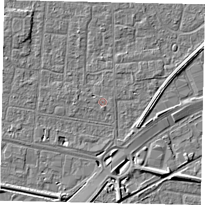 Shaded relief map of the ground around TW167TP, computed from Environment Agency LiDAR. The ground here sits at about 12 m above sea level and falls 8 m across the surrounding 800 m. Surface water reaching this point runs off ground lying to the west-north-west, 2.2 m higher.