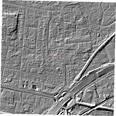 Shaded relief map of the ground around TW167TS, computed from Environment Agency LiDAR. The ground here sits at about 12 m above sea level and falls 8 m across the surrounding 800 m. Surface water reaching this point runs off ground lying to the west-north-west, 3.2 m higher.