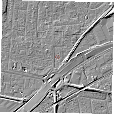 Shaded relief map of the ground around TW167UB, computed from Environment Agency LiDAR. The ground here sits at about 12 m above sea level and falls 8 m across the surrounding 800 m. Surface water reaching this point runs off ground lying to the south, 6.3 m higher.