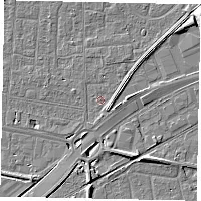 Shaded relief map of the ground around TW167UH, computed from Environment Agency LiDAR. The ground here sits at about 12 m above sea level and falls 9 m across the surrounding 800 m. Surface water reaching this point runs off ground lying to the south, 6.3 m higher.
