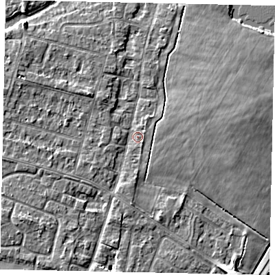 Shaded relief map of the ground around TW170EX, computed from Environment Agency LiDAR. The ground here sits at about 12 m above sea level and falls 6 m across the surrounding 800 m. Surface water reaching this point runs off ground lying to the east-north-east, 3.9 m higher.