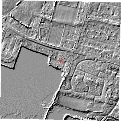 Shaded relief map of the ground around TW170JG, computed from Environment Agency LiDAR. The ground here sits at about 12 m above sea level and falls 7 m across the surrounding 800 m. Surface water reaching this point runs off ground lying to the south, 1.6 m higher.