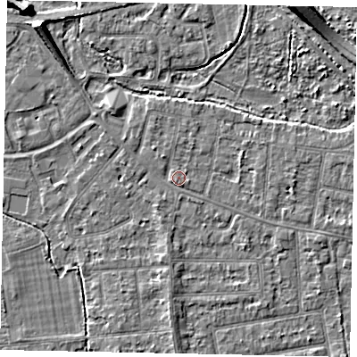 Shaded relief map of the ground around TW181AX, computed from Environment Agency LiDAR. The ground here sits at about 15 m above sea level and falls 7 m across the surrounding 800 m. Surface water reaching this point runs off ground lying to the north-west, 1.1 m higher.