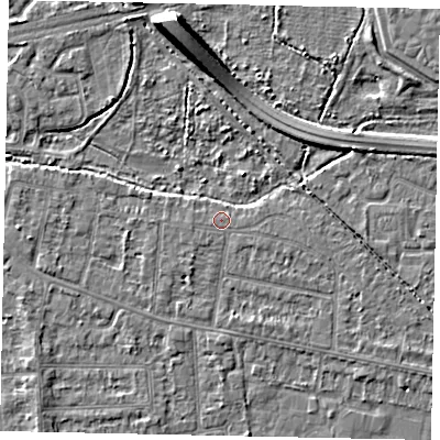 Shaded relief map of the ground around TW181DF, computed from Environment Agency LiDAR. The ground here sits at about 14 m above sea level and falls 8 m across the surrounding 800 m. Surface water reaching this point runs off ground lying to the west-south-west, 0.6 m higher.