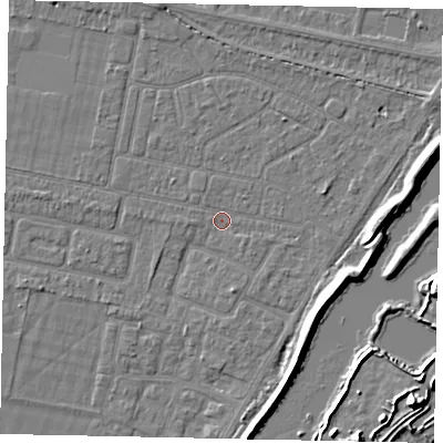 Shaded relief map of the ground around TW181JW, computed from Environment Agency LiDAR. The ground here sits at about 14 m above sea level and falls 7 m across the surrounding 800 m. Surface water reaching this point runs off ground lying to the east, 5.9 m higher.