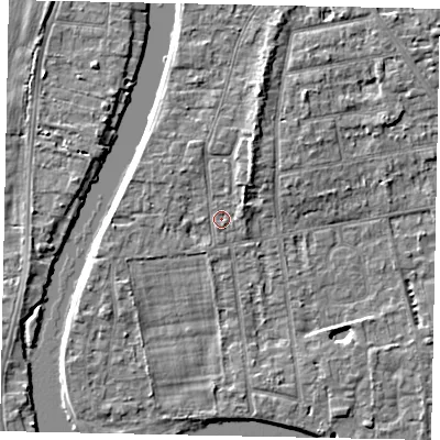 Shaded relief map of the ground around TW182LL, computed from Environment Agency LiDAR. The ground here sits at about 15 m above sea level and falls 5 m across the surrounding 800 m. Surface water reaching this point runs off ground lying to the north-north-east, 2.8 m higher.