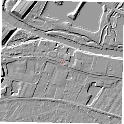 Shaded relief map of the ground around TW183BX, computed from Environment Agency LiDAR. The ground here sits at about 16 m above sea level and falls 9 m across the surrounding 800 m. Surface water reaching this point runs off ground lying to the east-north-east, 1.8 m higher.
